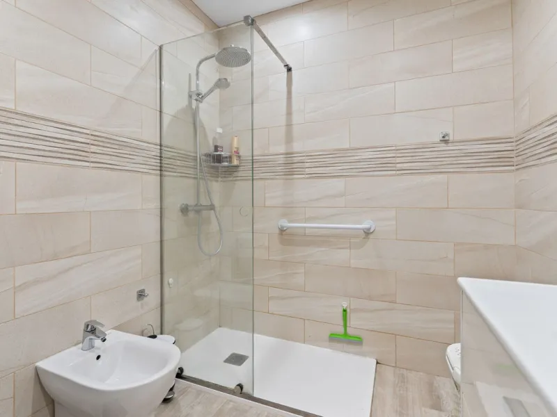 Townhouse located in a small Andalucian pueblo style community in Nueva Atalaya. The property is situated in a quiet cul de sac close to all local amenities, shopping centre, schools and golf. The community boasts a large swimming pool and park sized land