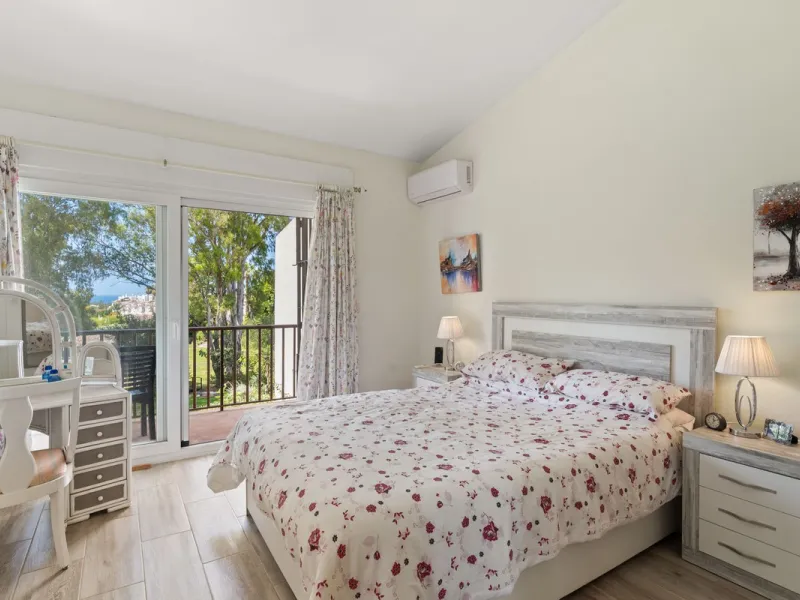 Townhouse located in a small Andalucian pueblo style community in Nueva Atalaya. The property is situated in a quiet cul de sac close to all local amenities, shopping centre, schools and golf. The community boasts a large swimming pool and park sized land