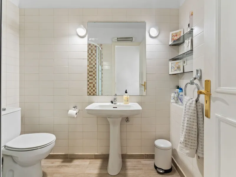 Townhouse located in a small Andalucian pueblo style community in Nueva Atalaya. The property is situated in a quiet cul de sac close to all local amenities, shopping centre, schools and golf. The community boasts a large swimming pool and park sized land