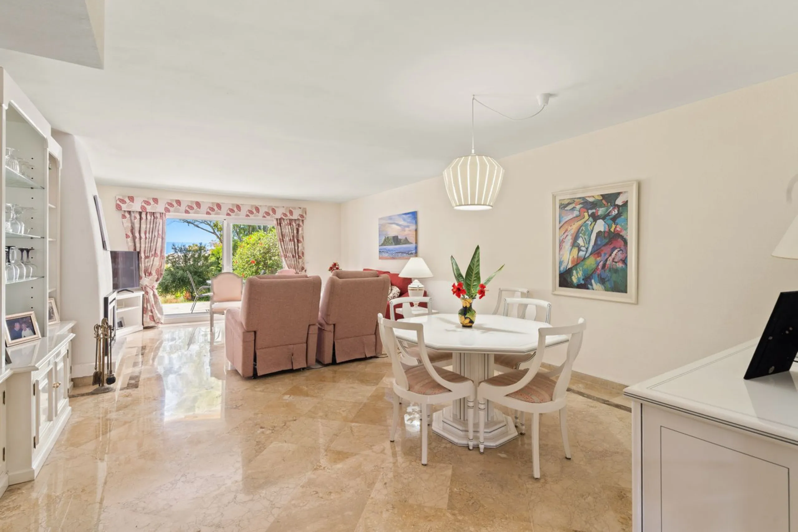 Townhouse located in a small Andalucian pueblo style community in Nueva Atalaya. The property is situated in a quiet cul de sac close to all local amenities, shopping centre, schools and golf. The community boasts a large swimming pool and park sized land