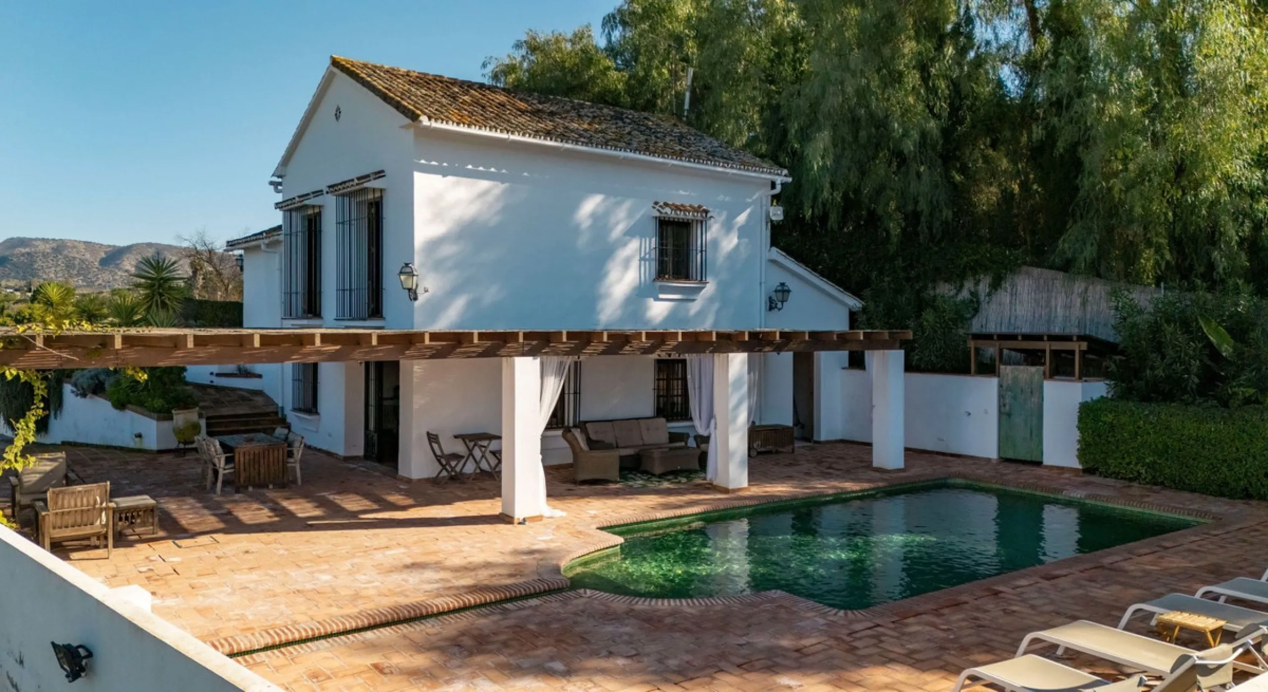 Experience the beauty of authentic Andalusian living with this stunning independent country house, beautifully restored in 2022 and perfectly positioned just a short drive from Alhaurín el Grande and Coín. Nestled on a fully fenced 12,074 m² plot, this fi