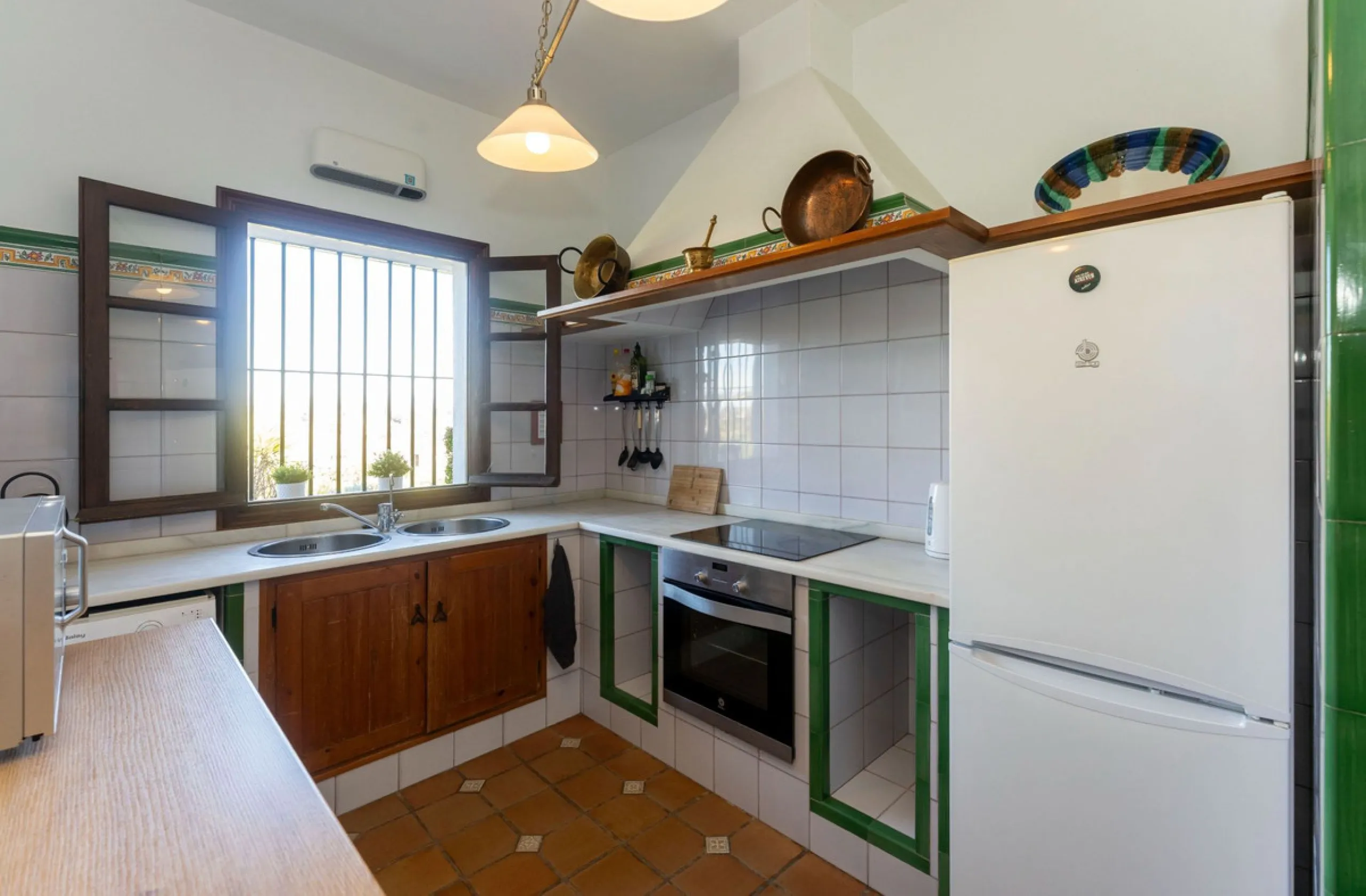 Experience the beauty of authentic Andalusian living with this stunning independent country house, beautifully restored in 2022 and perfectly positioned just a short drive from Alhaurín el Grande and Coín. Nestled on a fully fenced 12,074 m² plot, this fi