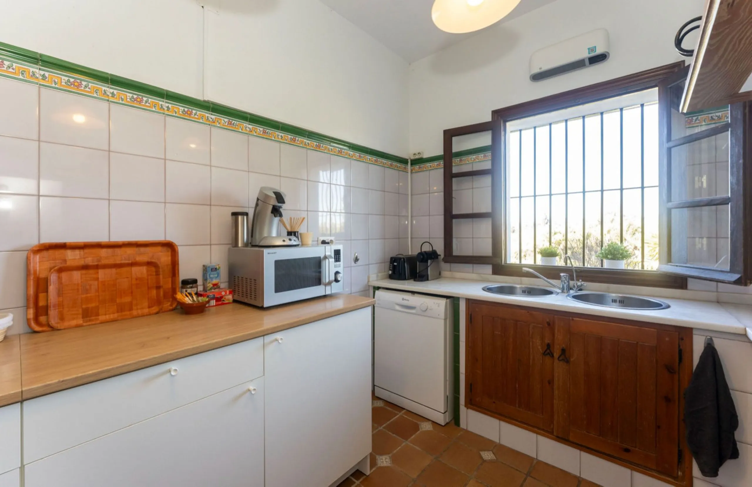 Experience the beauty of authentic Andalusian living with this stunning independent country house, beautifully restored in 2022 and perfectly positioned just a short drive from Alhaurín el Grande and Coín. Nestled on a fully fenced 12,074 m² plot, this fi
