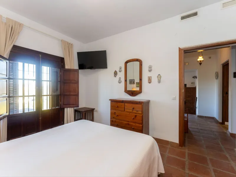 Experience the beauty of authentic Andalusian living with this stunning independent country house, beautifully restored in 2022 and perfectly positioned just a short drive from Alhaurín el Grande and Coín. Nestled on a fully fenced 12,074 m² plot, this fi