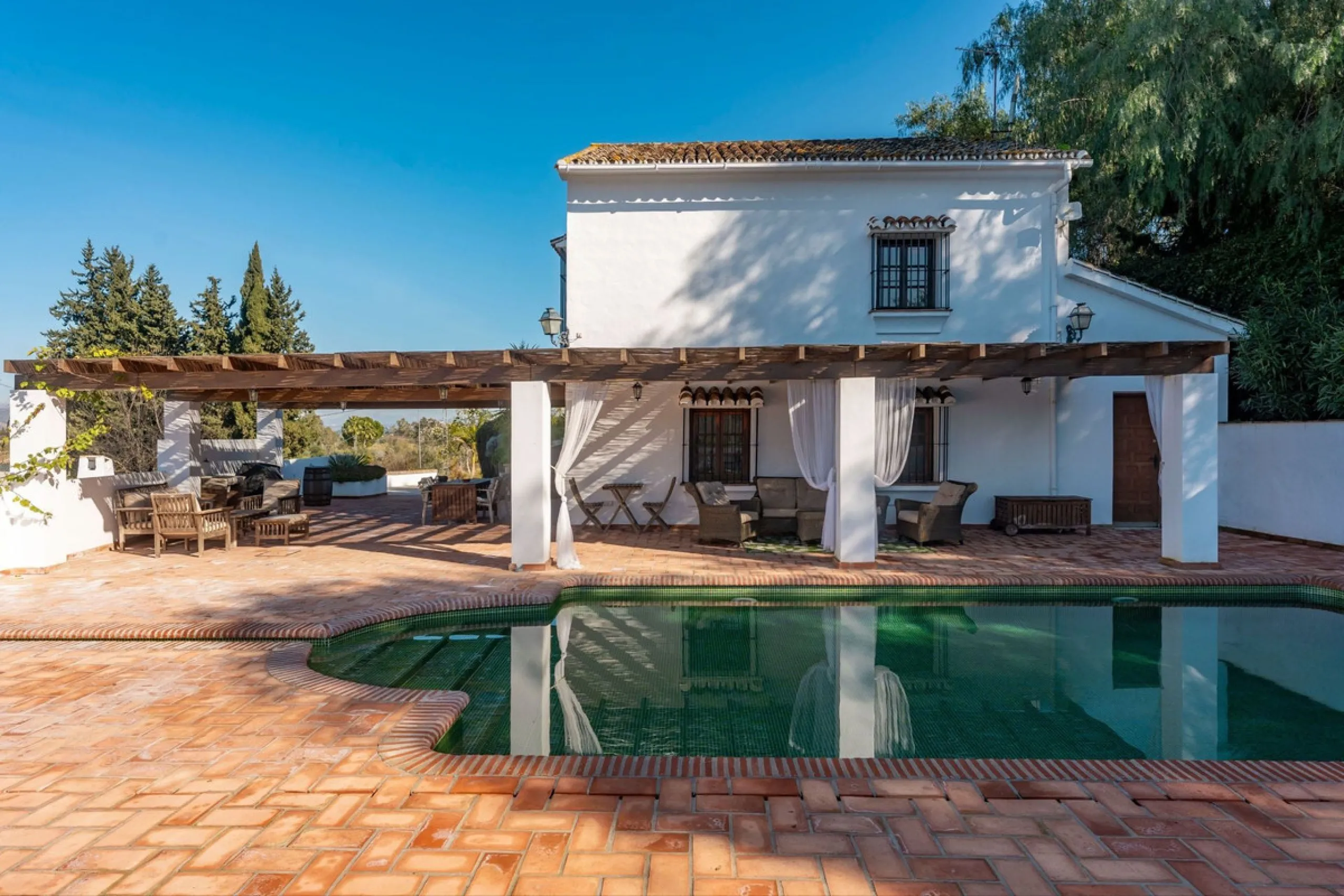 Experience the beauty of authentic Andalusian living with this stunning independent country house, beautifully restored in 2022 and perfectly positioned just a short drive from Alhaurín el Grande and Coín. Nestled on a fully fenced 12,074 m² plot, this fi