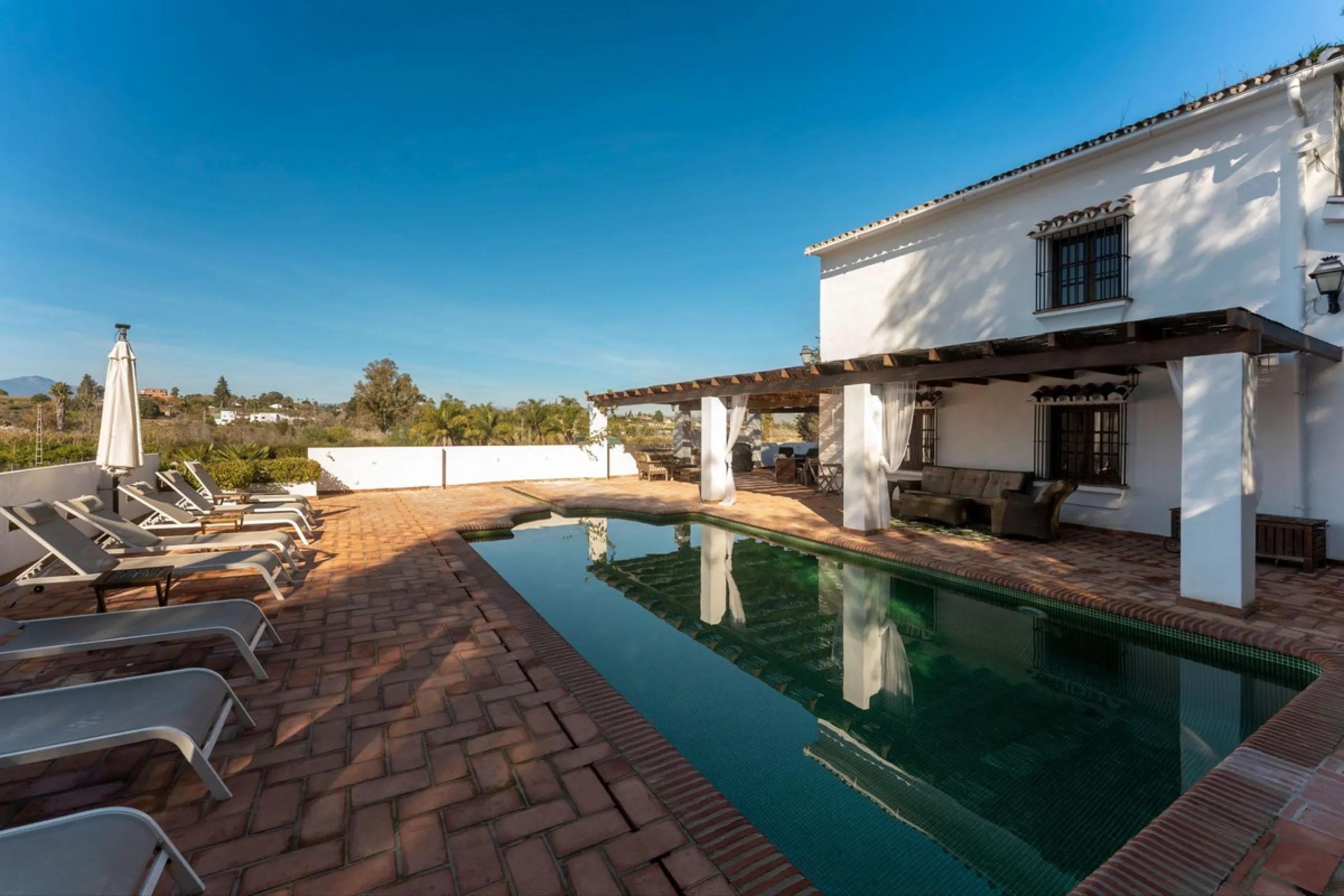 Experience the beauty of authentic Andalusian living with this stunning independent country house, beautifully restored in 2022 and perfectly positioned just a short drive from Alhaurín el Grande and Coín. Nestled on a fully fenced 12,074 m² plot, this fi