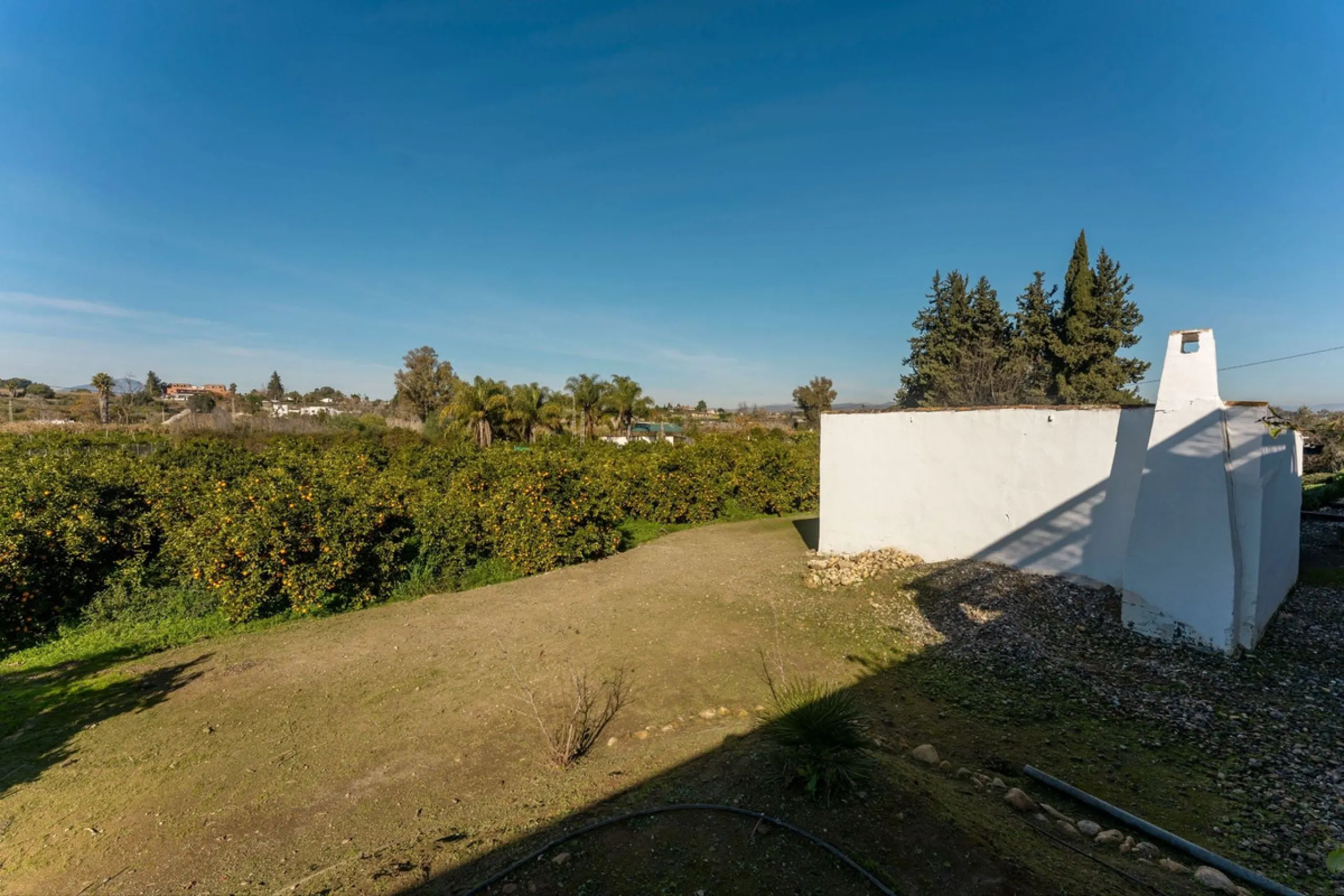 Experience the beauty of authentic Andalusian living with this stunning independent country house, beautifully restored in 2022 and perfectly positioned just a short drive from Alhaurín el Grande and Coín. Nestled on a fully fenced 12,074 m² plot, this fi