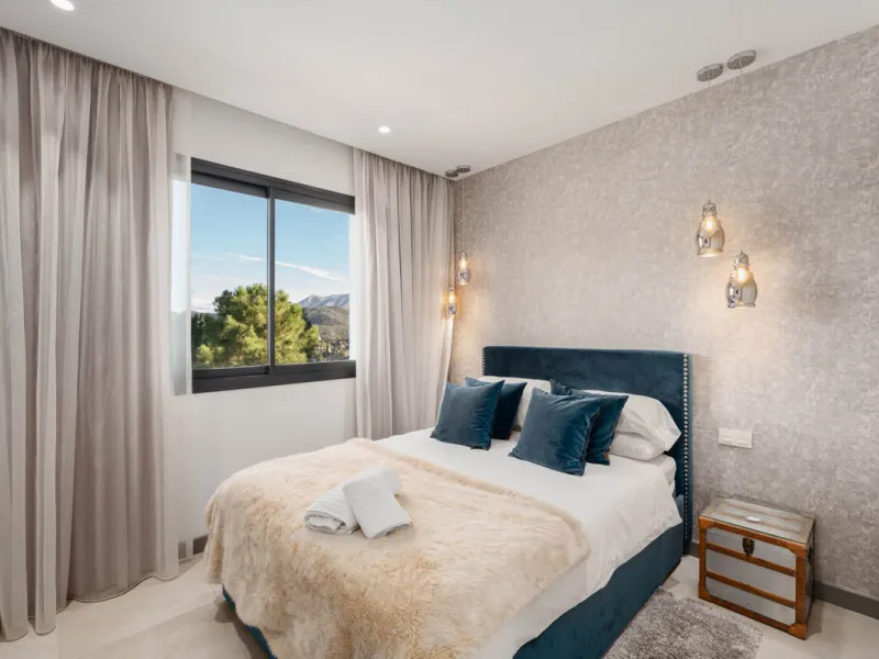 Designed by a distinguished architect, this villa is spread over two levels with an impressive built area. It features five luxurious bedrooms, each with its ensuite bathroom, an additional guest toilet, and a guest apartment that matches the main villa's