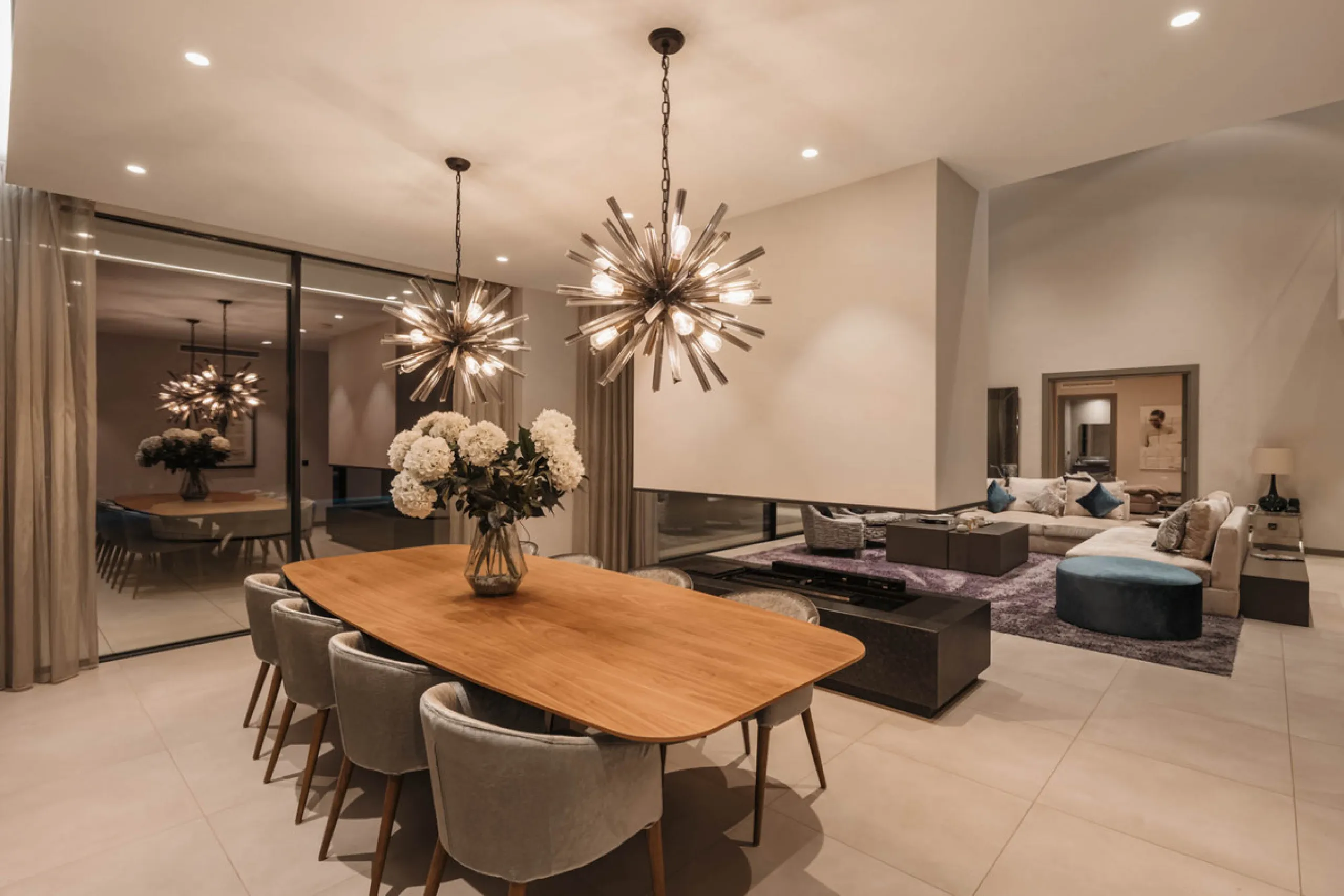 Designed by a distinguished architect, this villa is spread over two levels with an impressive built area. It features five luxurious bedrooms, each with its ensuite bathroom, an additional guest toilet, and a guest apartment that matches the main villa's
