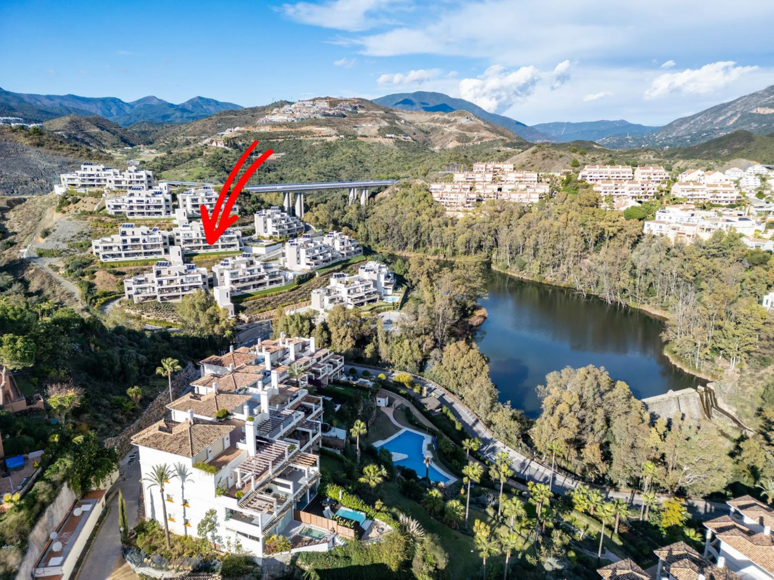 Experience modern Mediterranean living in this stunning 2-bedroom apartment within Marbella Lake, a prestigious gated community in the peaceful hills of Nueva Andalucía. Marbella Lake offers a harmonious blend of nature, comfort, and panoramic views, just