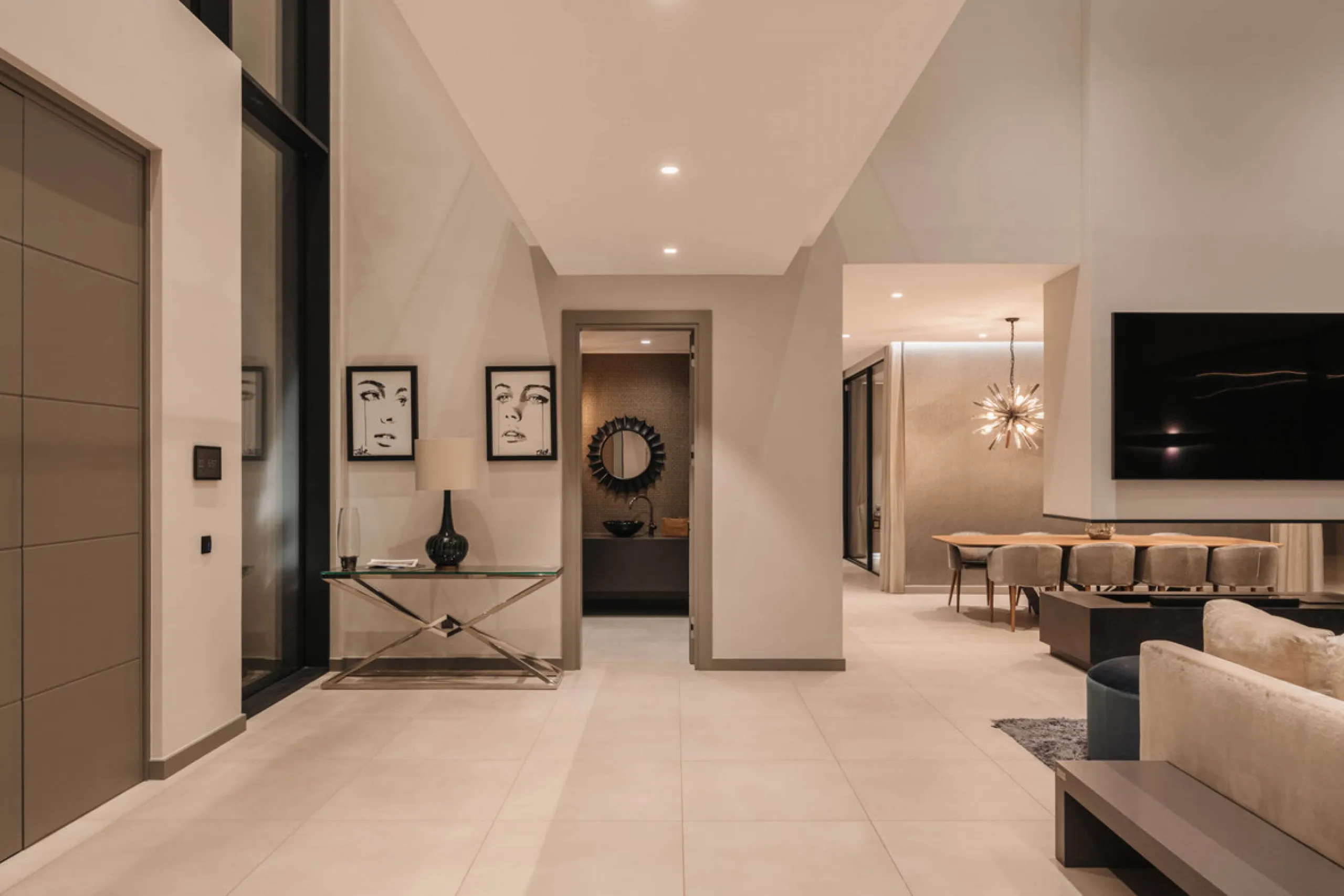 Designed by a distinguished architect, this villa is spread over two levels with an impressive built area. It features five luxurious bedrooms, each with its ensuite bathroom, an additional guest toilet, and a guest apartment that matches the main villa's