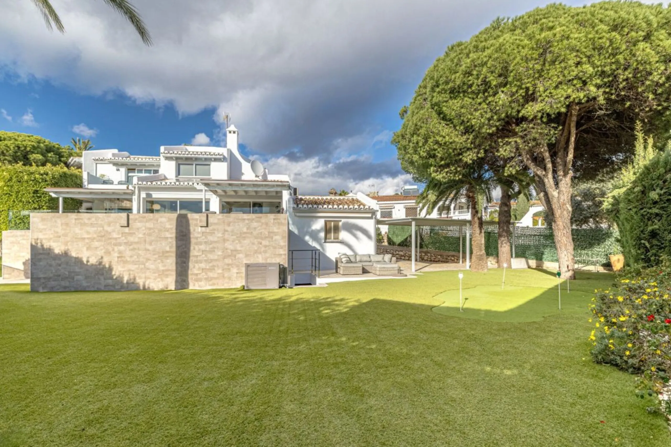 Nestled in the prestigious residential enclave of Las Chapas, Marbella, this charming traditional-style five-bedroom villa offers privacy, space, and timeless Mediterranean appeal, just minutes from the best beaches and beach bars of the Costa del Sol.