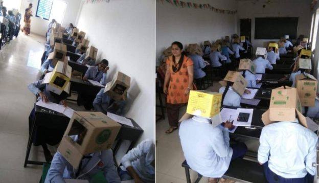 İmtahanda şok olay: müəllimlər şagirdlərin başına qutu keçirib + FOTO 