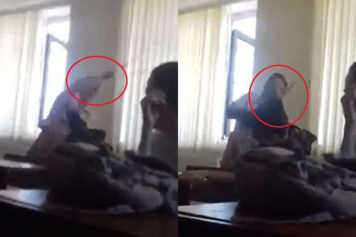 Bakıda məktəbdə direktor şagirdləri çubuqla döydü - VİDEO