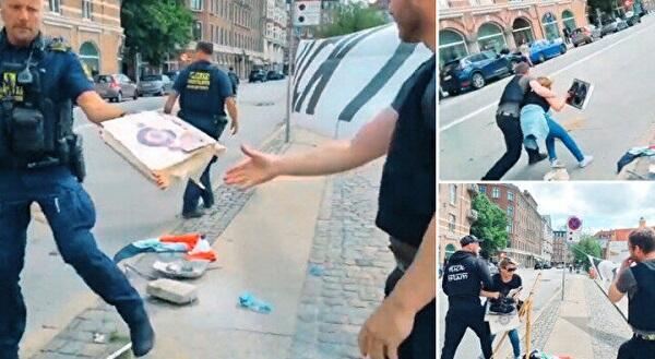 Polis Quranı xilas etməyə çalışan qadına hücum etdi – Video 