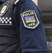 Polisin əlindəki bort kompüteri alaraq qaçmaq istədi 