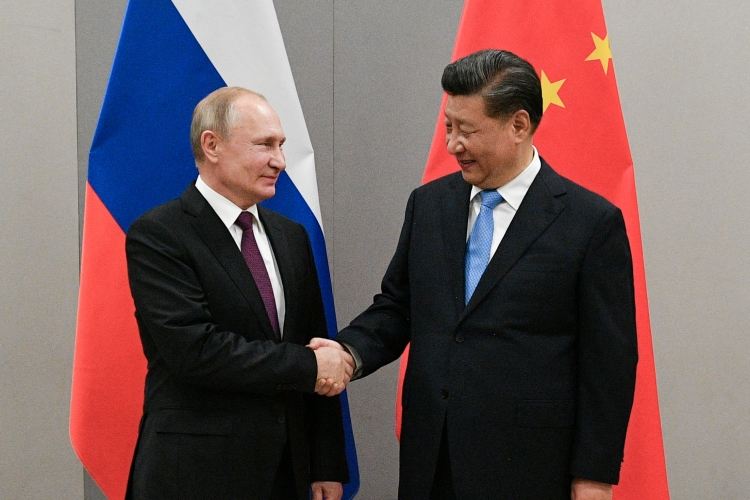 Putinin Çin sədri ilə görüşü başlayıb 