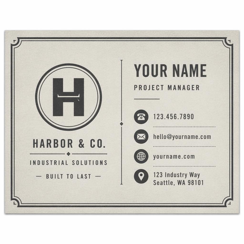 Front view of a vintage letterpress business card in industrial gray with clean placeholder contact details and balanced space.