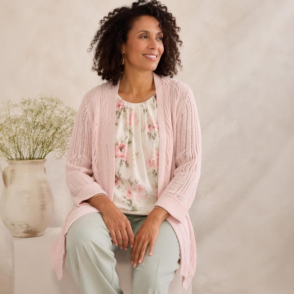 Studio fashion lookbook image of a model in a pastel coastal grandmother outfit with soft dreamy lighting and neutral backdrop.