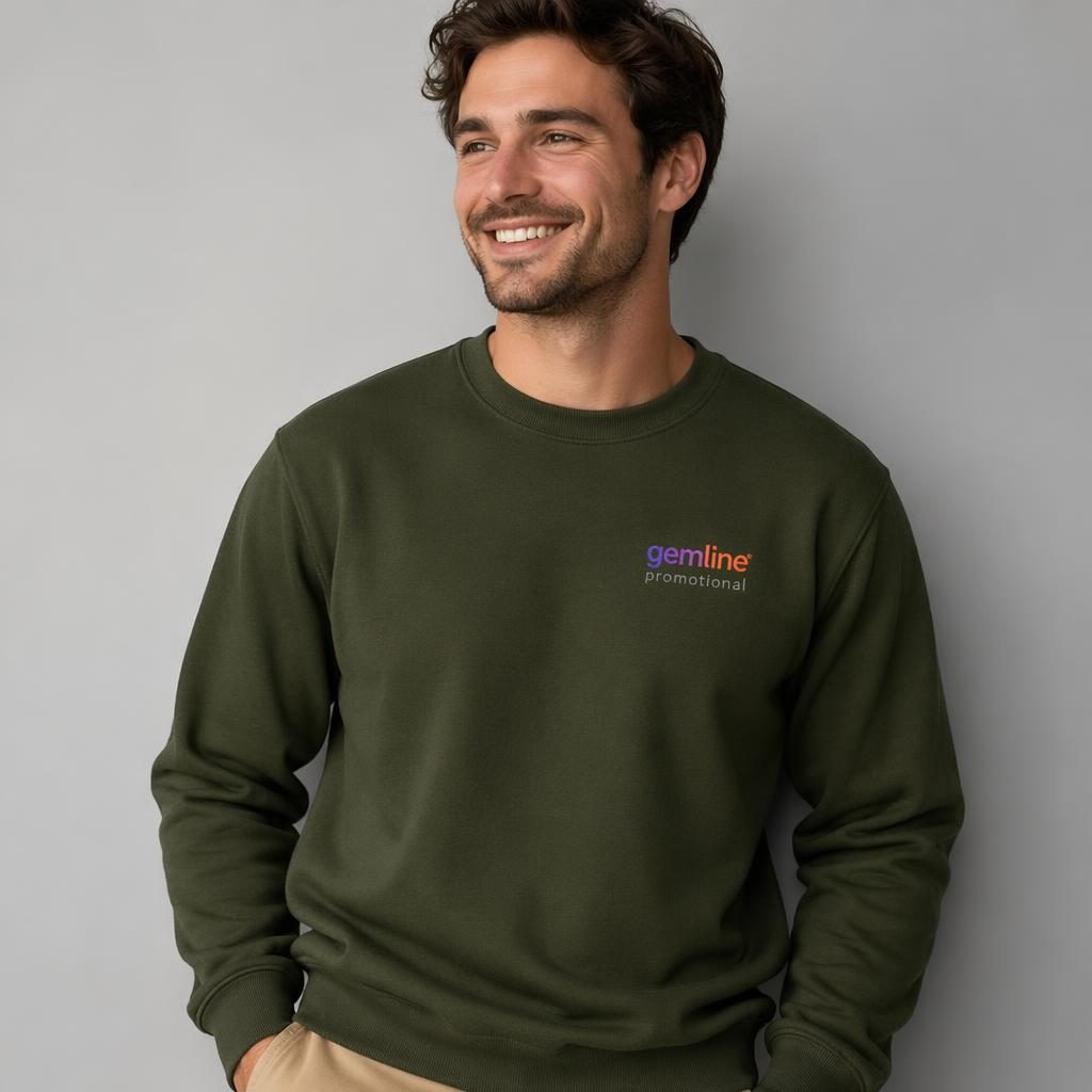 Model wearing an olive green crewneck with gemline promotional logo embroidery in a vibrant gradient, studio shot