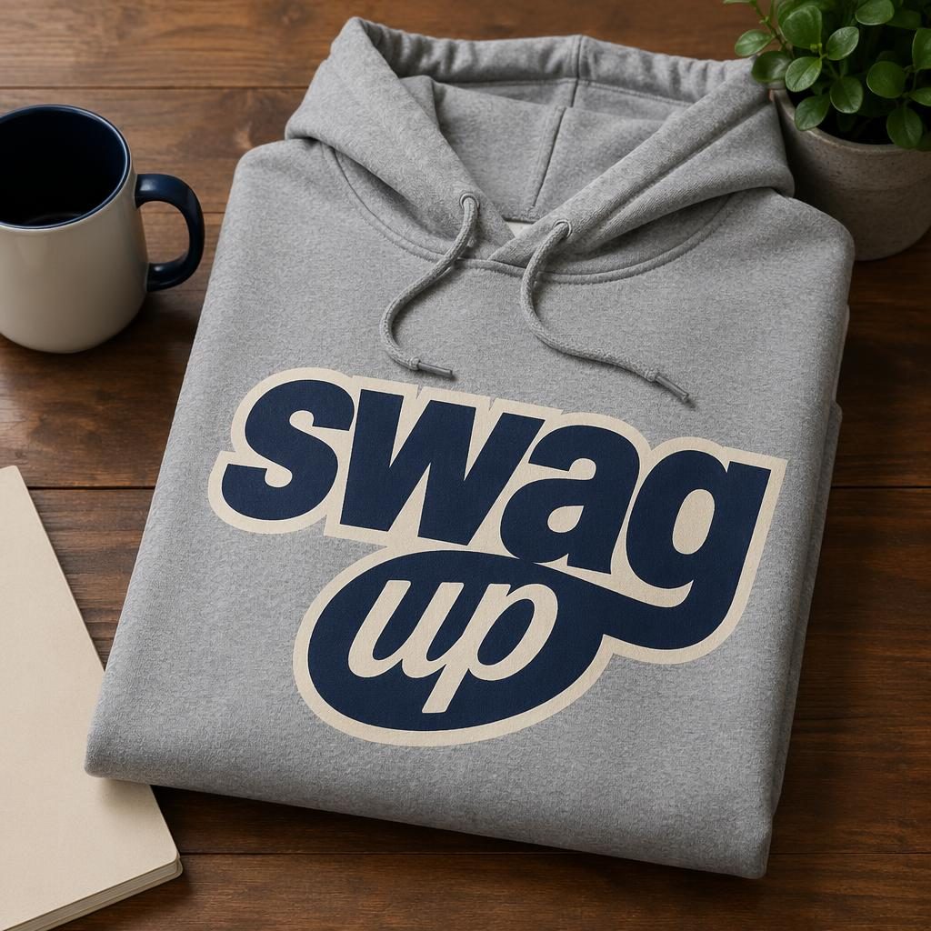 Folded stack of heather gray hoodies with a large navy and cream swag up logo in a studio product mockup