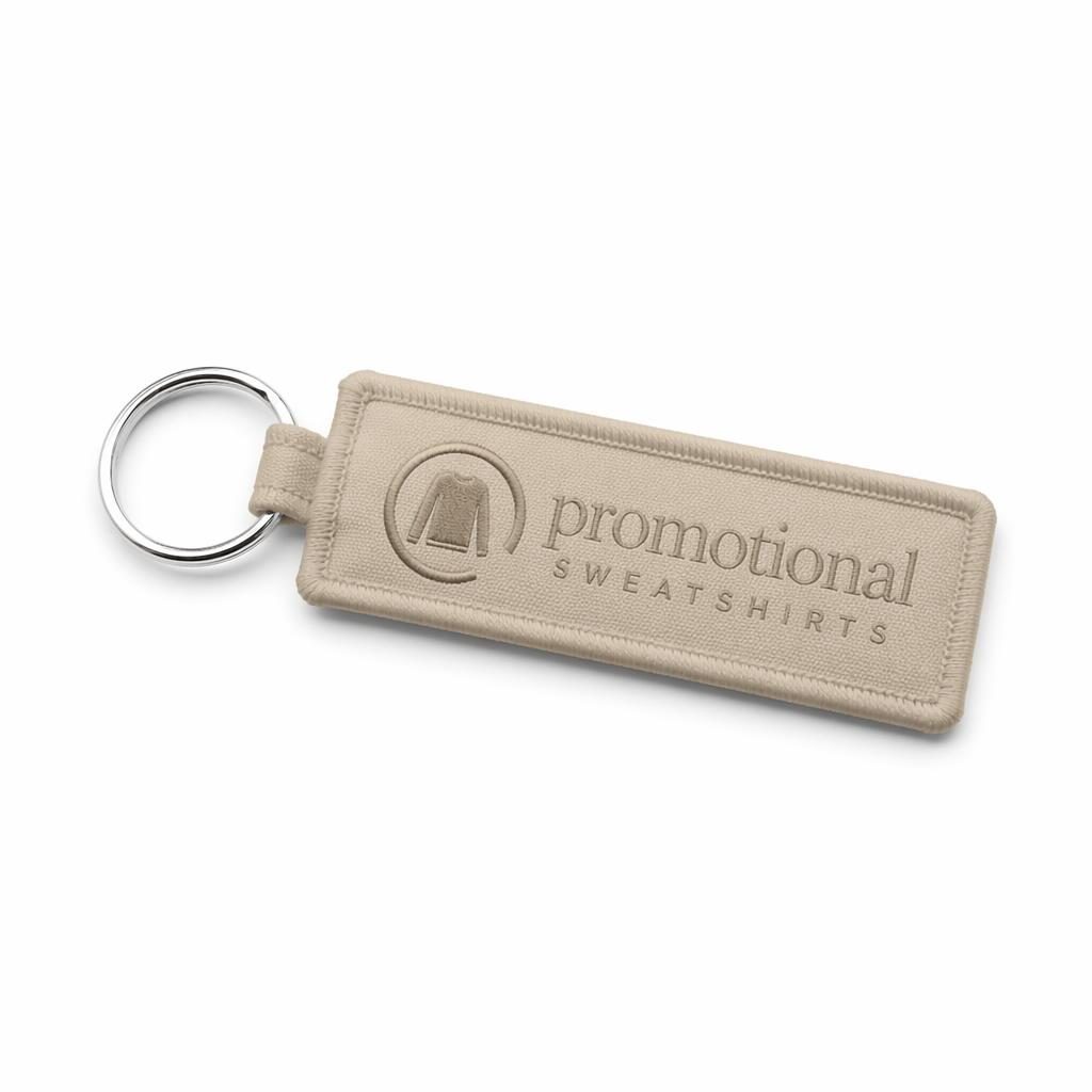Beige sand keychain mockup on a white background with a subtle tone-on-tone promotional sweatshirts logo.