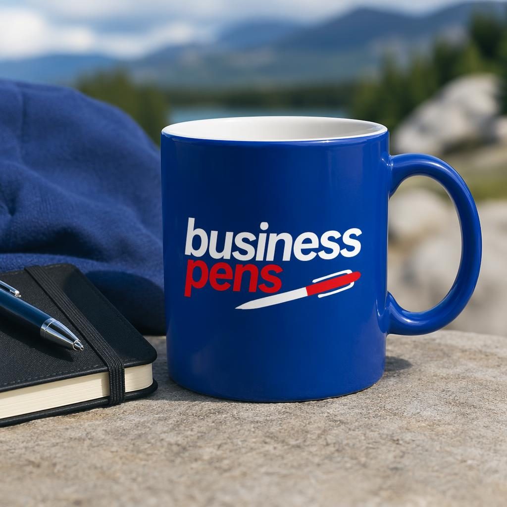 Royal blue ceramic mug with generic business pens logo sleeve in an outdoor lifestyle mockup, sharp studio-quality detail.