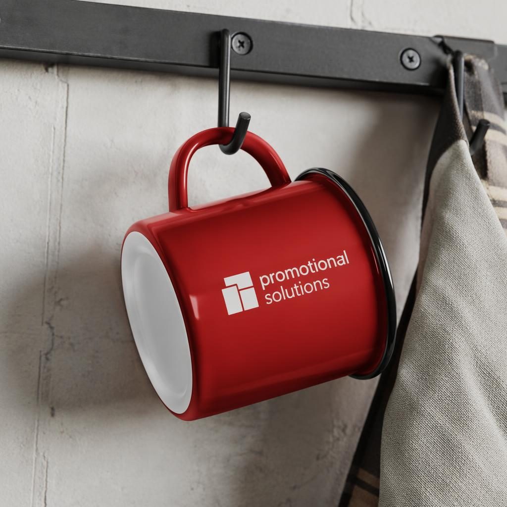Red enamel mug hanging on a rack with promotional solutions logo on the back in a minimal monochrome design