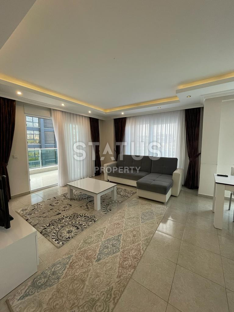 Spacious furnished 1+1 apartment in Mahmutlar, 75 sq.m. фото 1