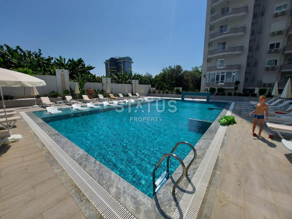 Квартира 1+1 в элитном новом комплексе, 60 м2 в Махмутларе. фото 2