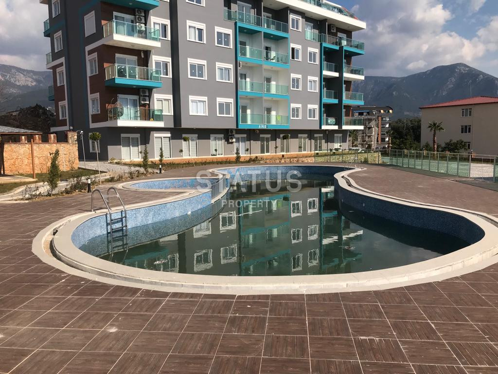 Four 1+1 apartments in a new complex, Oba district фото 1