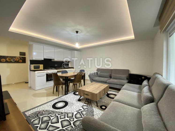Квартира 1+1 в элитном комплексе в районе пляжа Клеопатры, 65 м2. фото 1