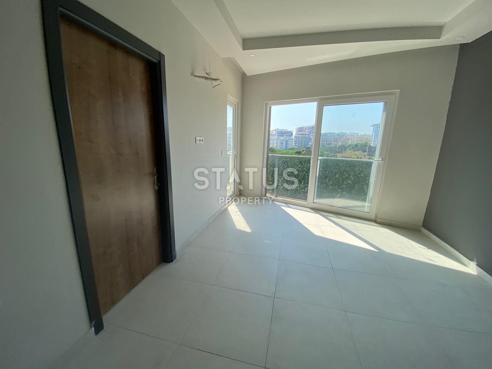 Apartment 1+1 in a complex surrounded by nature in Mahmutlar, 55 m2. фото 1
