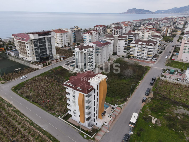 Меблированный садовый дуплекс 3+1 в 2 минутах от моря в Кестеле, 130 м2. фото 1