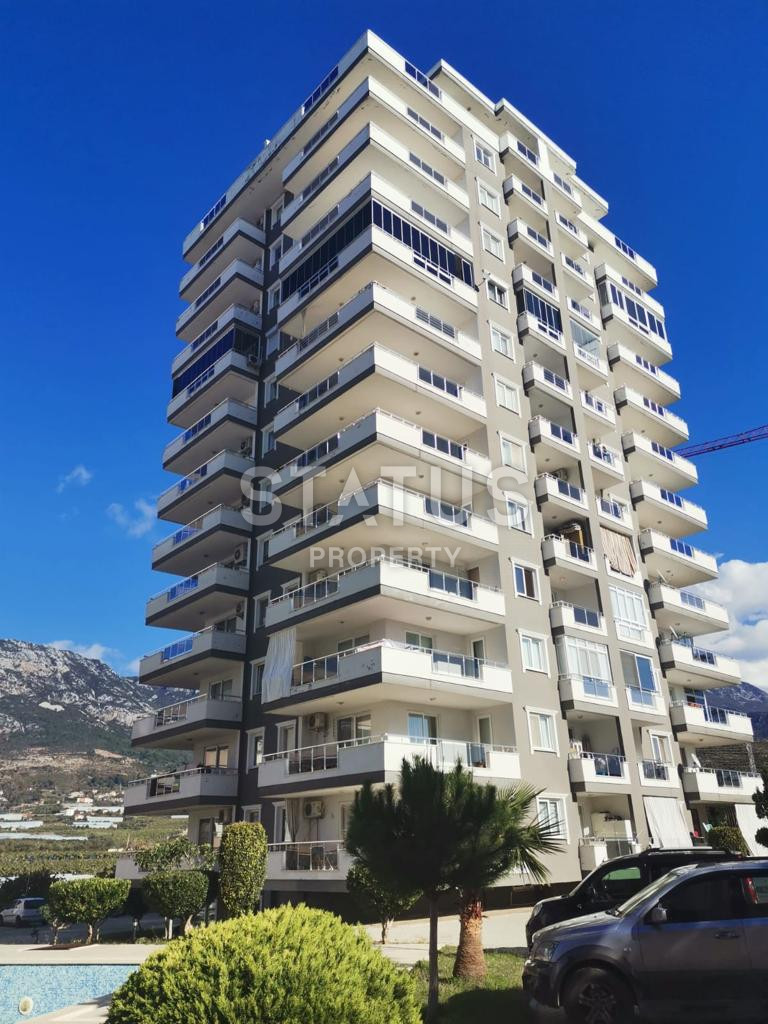 Apartment 2+1 in Mahmutlar with a view of the sea and the fortress, affordable price! фото 1