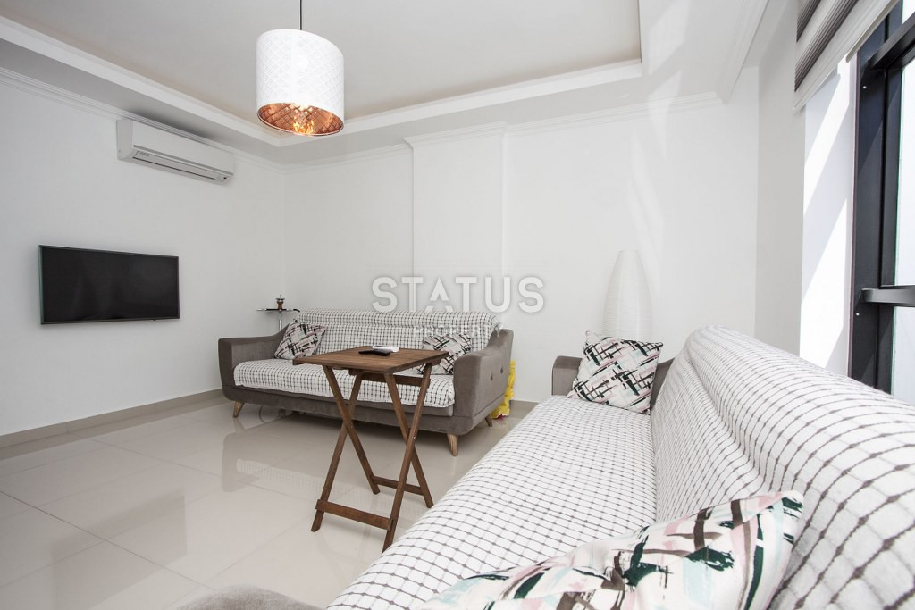 One-bedroom furnished apartment in an urban-type building on Cleopatra, 58m2 фото 2