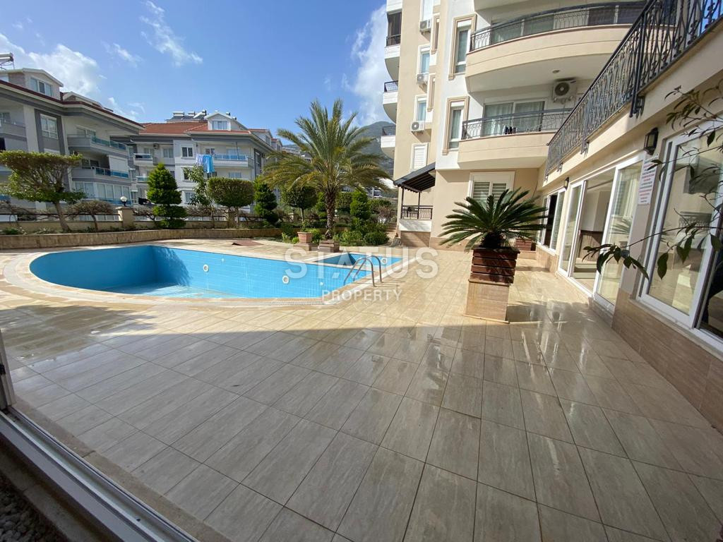 Three-room apartment with separate kitchen and sea view in the center of Alanya фото 1
