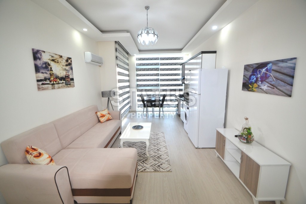 New apartment 2+1 with furniture, in a new complex of 2019 in the Mahmutlar district, 80 sq. m. фото 1