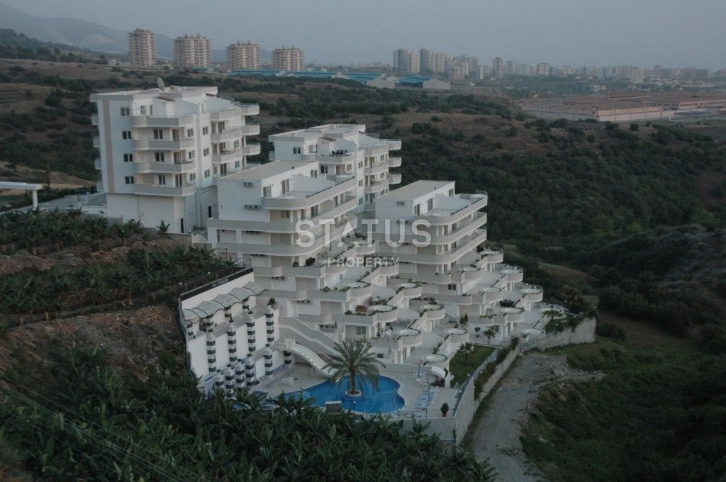Двухуровневая квартира 2+1 с видом на море и крепость в Махмутларе. 120м2 фото 1