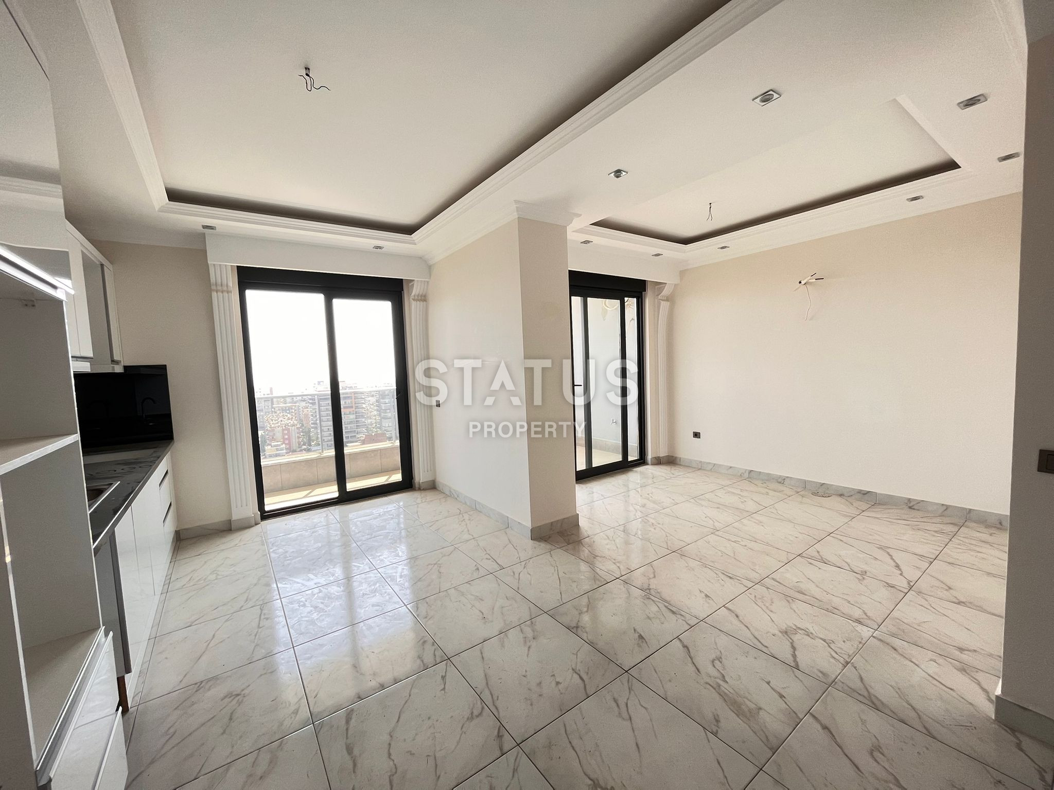 Spacious four-room apartment with panoramic views in Mahmutlar. 180m2 фото 1