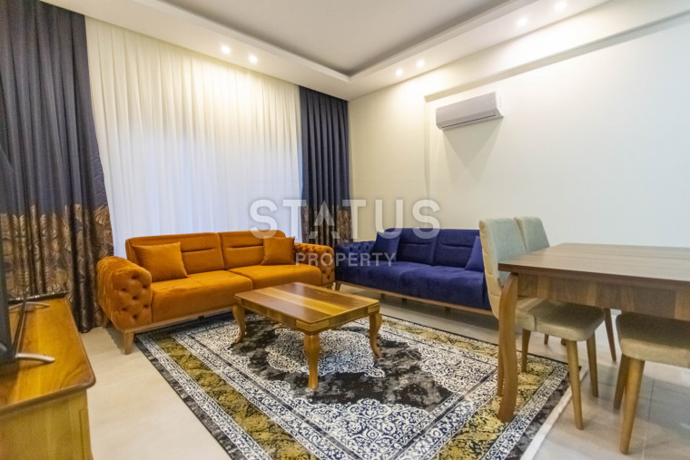 Two apartments 1+1 in one residential complex with full infrastructure in Mahmutlar. 60m2 photos 1