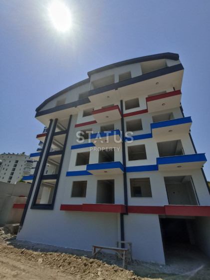 Двухкомнатная квартира по выгодной цене в новостройке в Махмутларе. 60м2 фото 1