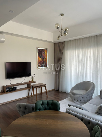 Furnished apartments 1+1 in a residential complex of hotel type in Mahmutlar. 64m2 photos 1