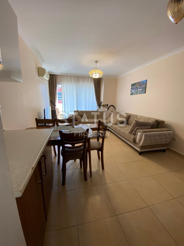 Spacious furnished 1+1 apartment in a complex with infrastructure in Mahmutlar. 65m2 фото 2