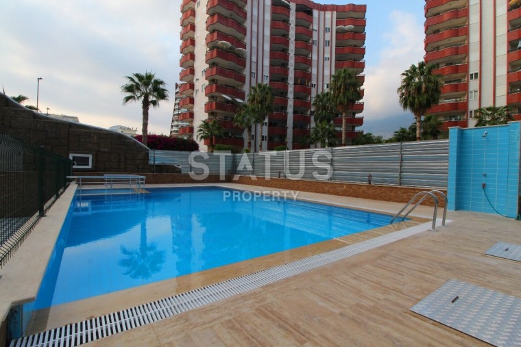 Двухкомнатные апартаменты в комплексе с бассейном в Махмутларе, 65 м2. фото 1