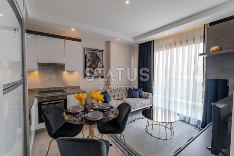 Furnished apartments 1+1 in Mahmutlar in the complex of a premium developer, 50 m2 photos 1