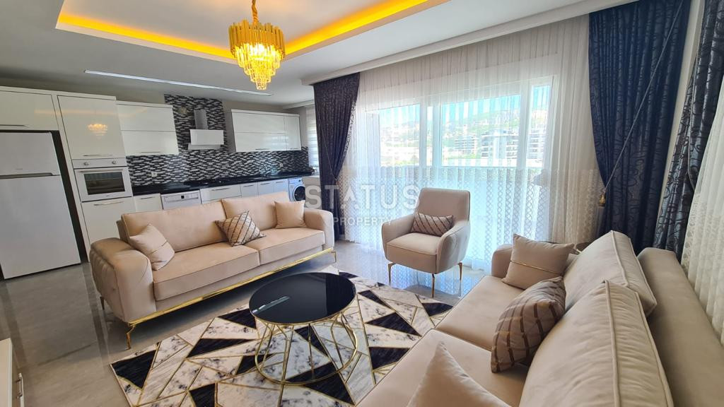 Three-room furnished apartment 250m from the sea in Kargicak. 120m2 фото 1