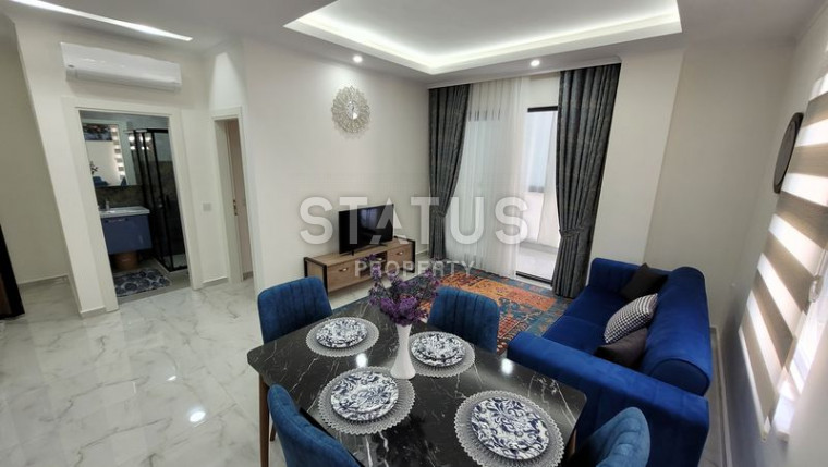 Spacious two-room apartment 400m from the sea in Mahmutlar. 75m2 photos 1