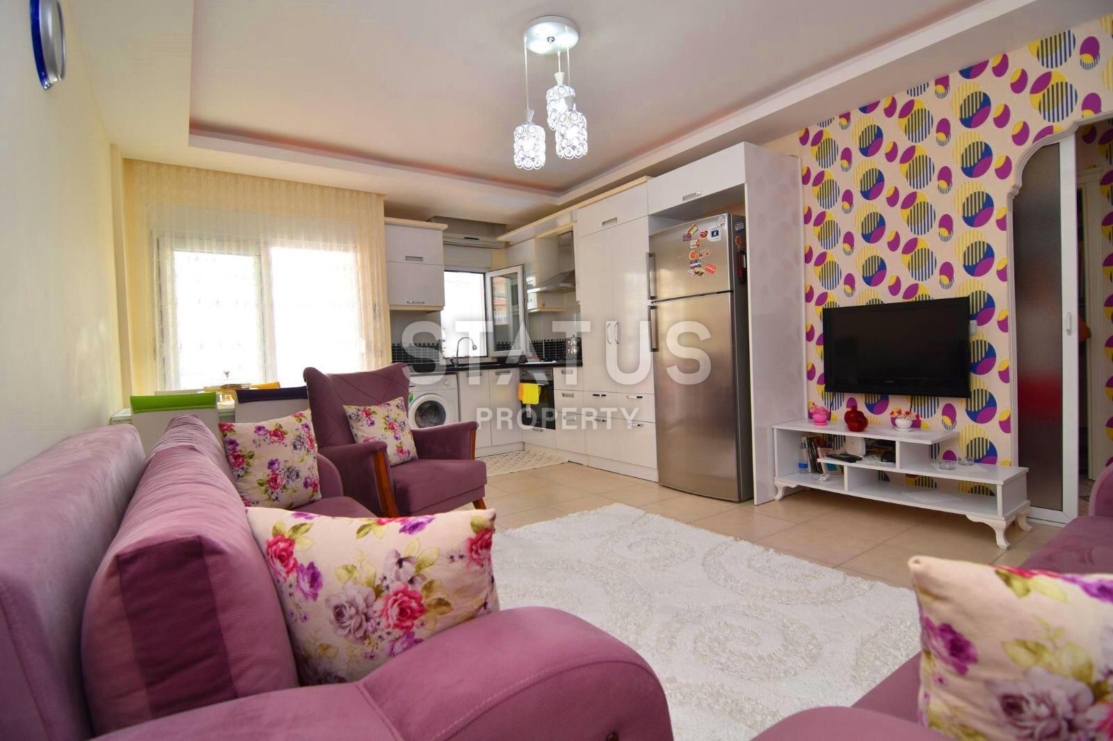 Двухкомнатная квартира в Махмутларе с мебелью и бытовой техникой, 65 кв. м. фото 2