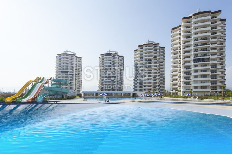 Residential complex with rich infrastructure 70m from the sea in the Erdemli district, Cheshmeli microdistrict, Mersin. 73m2 -111m2 photos 1